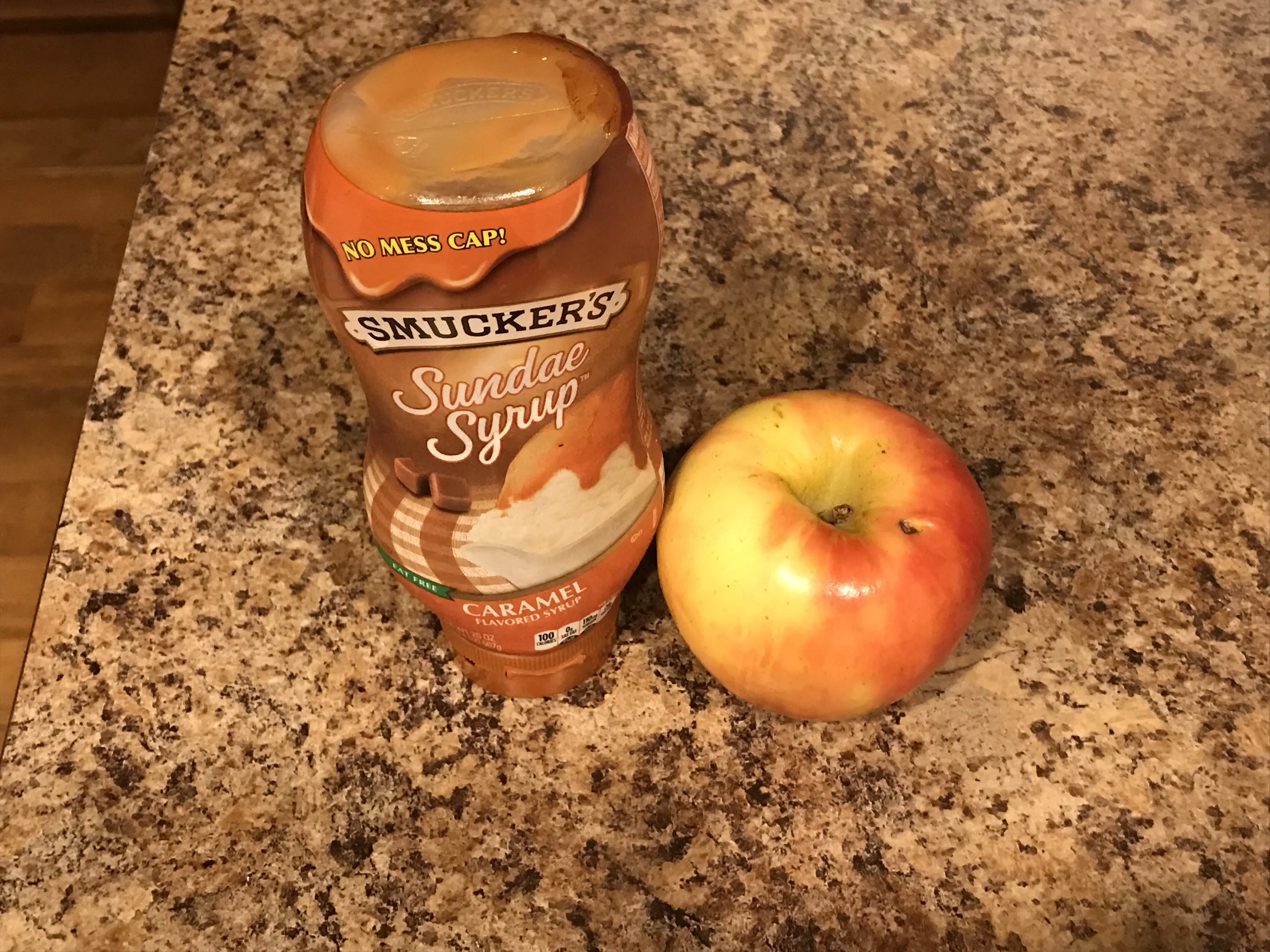 The best and fastest snack of all time apple and caramel snack. You must have just apples and caramel sauce to make this delicious treat.
